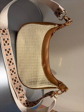 Cream Woven Crossbody Bag with Tan Trim and Patterned Strap